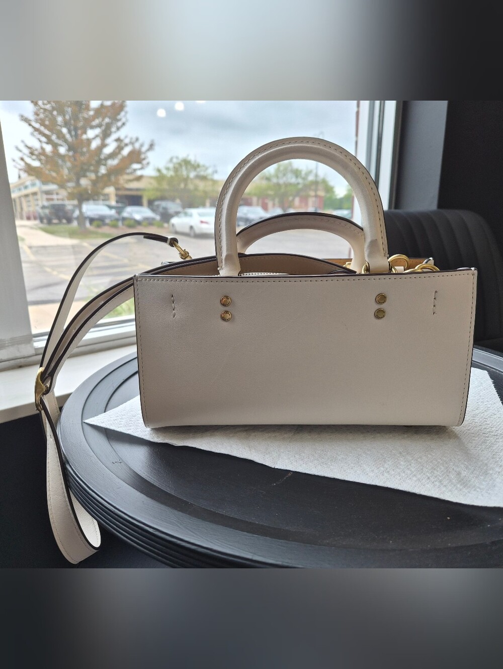 Elegant Cream Leather Top-Handle Bag with Detachable Strap